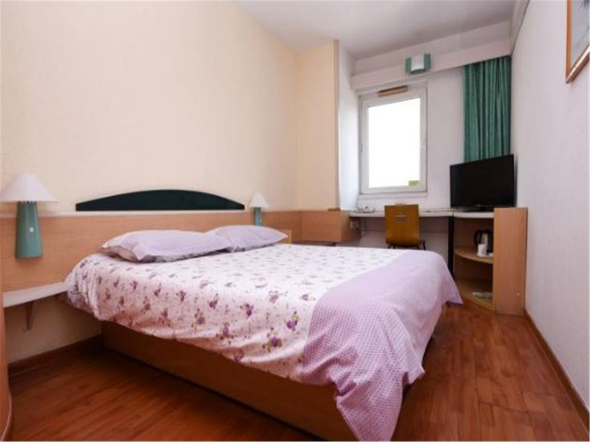 Motel Qingdao Jiaonan Renmin Road Business Street Exterior photo